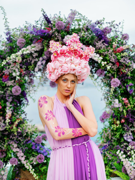 Floral arch portrait with couture guest styling at a luxury Athens wedding at Island Resort Athens Riviera