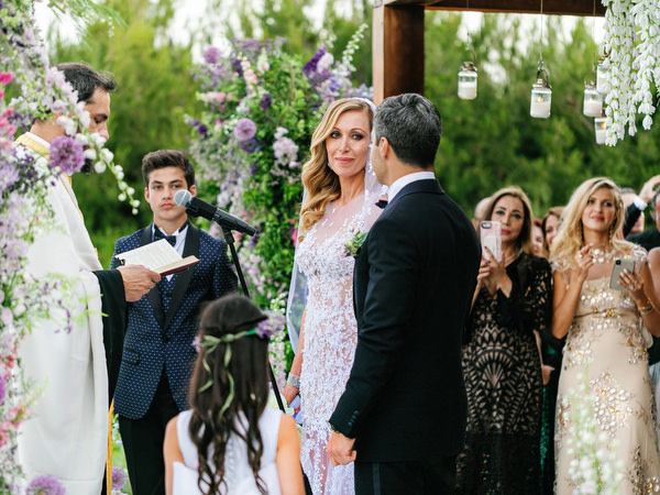 Ceremony entrance moment during a floral-forward Athens wedding at Island Resort Athens Riviera