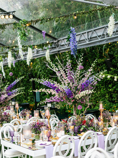 Elegant reception seating beneath hanging florals at a destination Athens wedding at Island Resort Athens Riviera