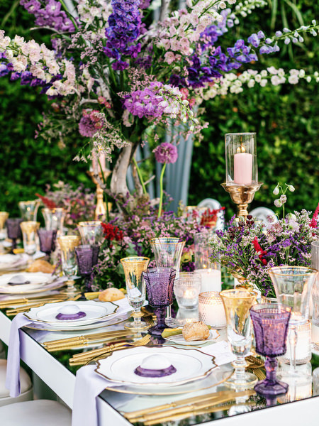 Opulent wedding table styling with crystal glassware and purple blooms at an Athens wedding at Island Art & Taste
