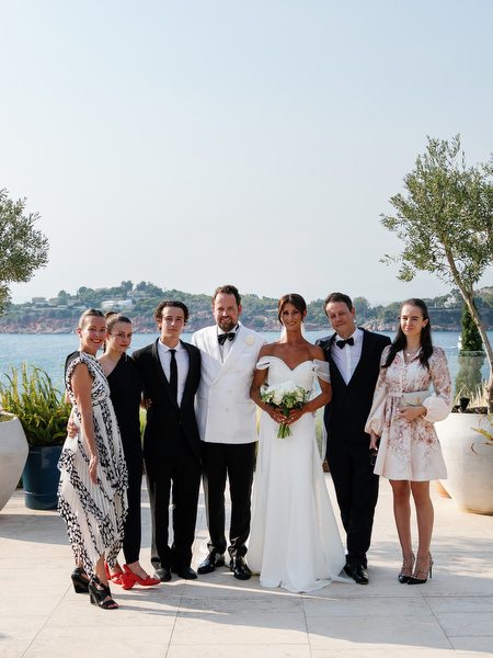 Bride and groom with close family members following ceremony at Four Seasons Athens