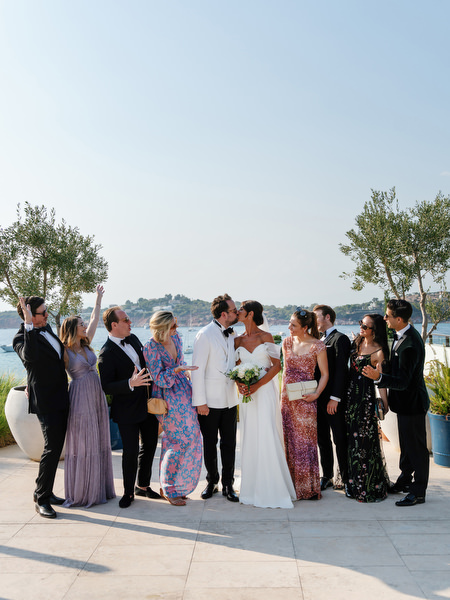 Group portrait of family and friends in formal evening wear at luxury Athens wedding