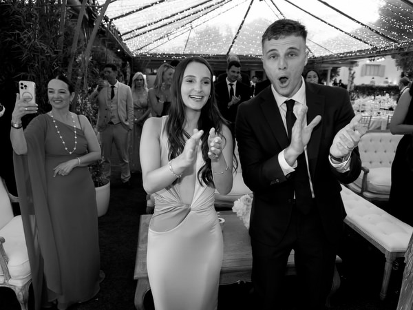 Guests reacting joyfully during luxury Island Resort Athens Riviera wedding celebration