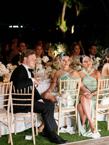 Guests seated on white lounge furniture during luxury Athens Riviera wedding reception