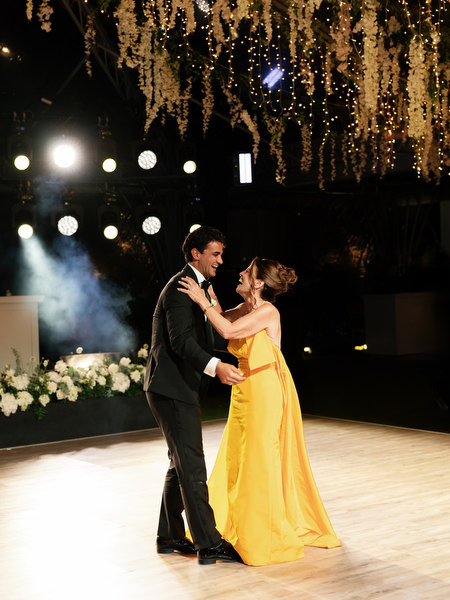 Groom dancing with mother during reception at Island Resort Athens Riviera