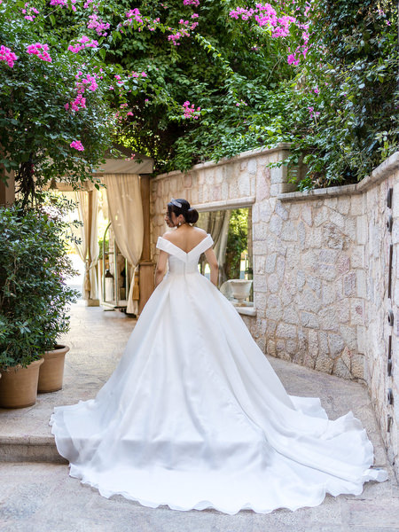 Bride portrait with floral greenery during Athens Riviera wedding