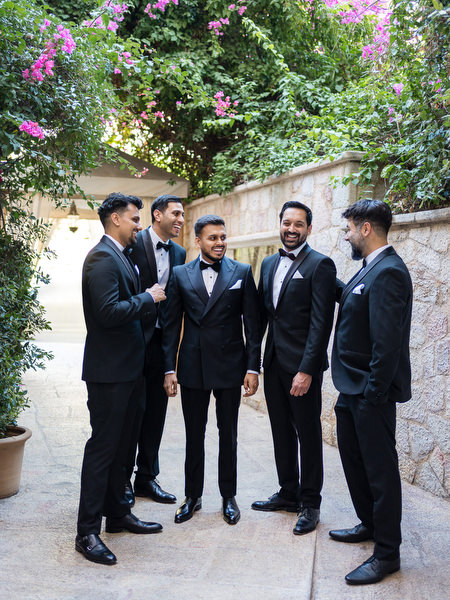 Groomsmen and groom group portrait at Margie Hotel