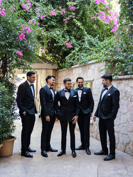 Wedding party portrait with groom during Athens Riviera celebration at Margie Hotel