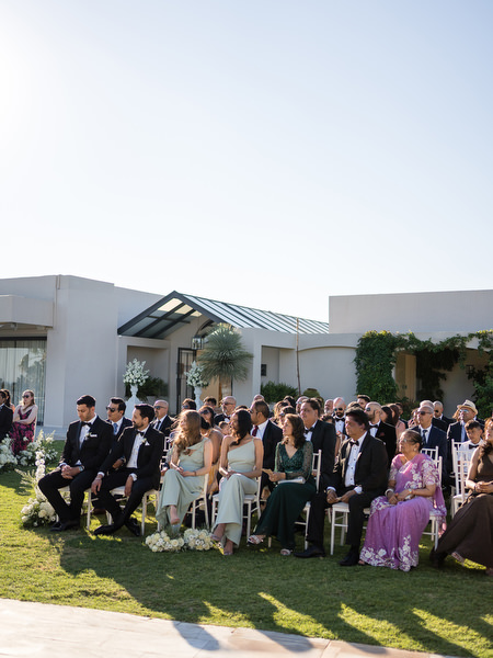 Wedding guests watching ceremony on Athens Riviera lawn