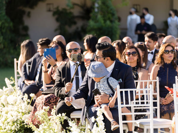Wedding guests celebrating newlyweds during Athens ceremony