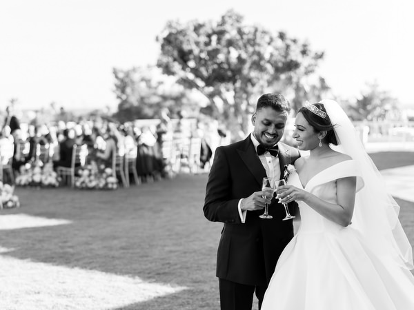 Black and white romantic portrait of bride and groom in Athens