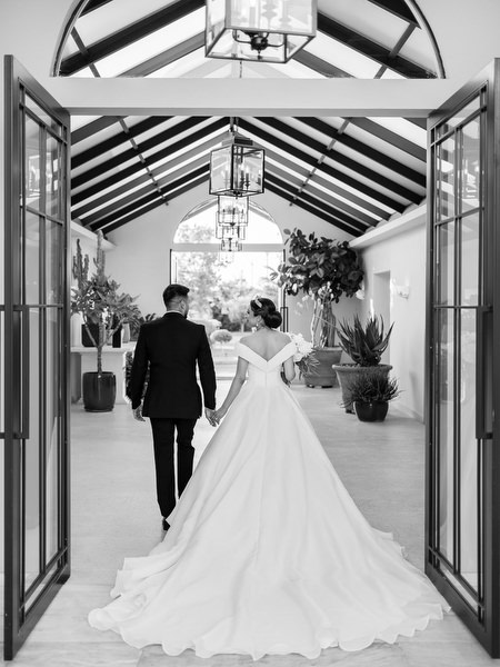 Bride and groom portrait inside elegant wedding venue