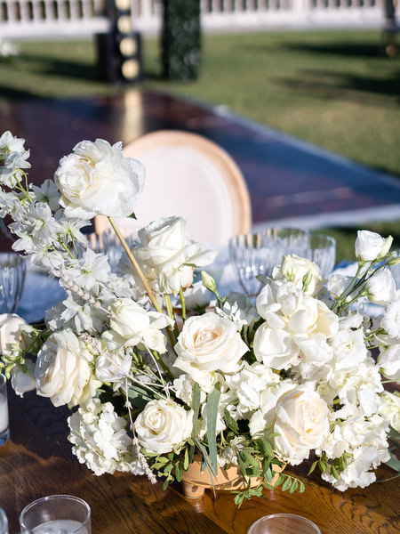 Floral arrangement detail at Golf Privé Glyfada wedding reception