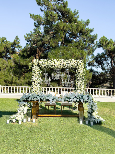 Outdoor wedding ceremony setup at Golf Privé Glyfada on the Athens Riviera