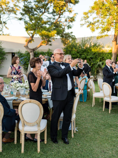 Wedding guests during couple entrance at Athens Riviera wedding