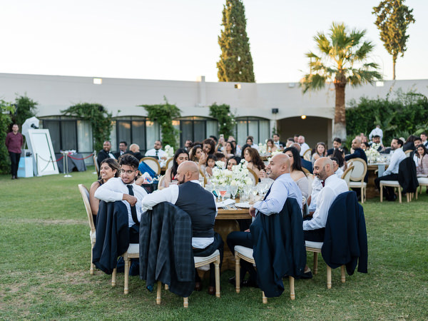 Wedding guests seated during reception dinner in Athens
