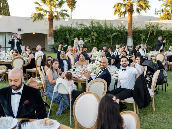 Wedding guests seated during reception dinner in Athens