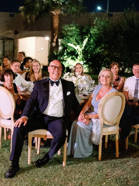 Guests reacting during emotional speech at Golf Privé Glyfada wedding