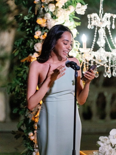 Bridesmaid giving speech during Athens wedding reception