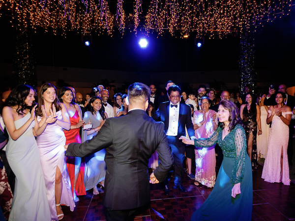 Couple celebrating with guests during Athens wedding dance floor