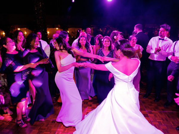 Wedding guests celebrating on dance floor at Golf Privé Glyfada