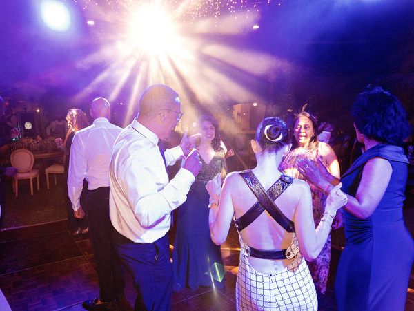 Energetic dance floor celebration during Athens wedding reception