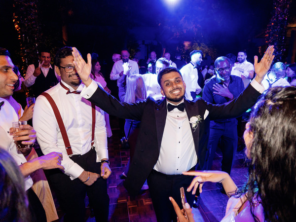 Dance floor celebration during Athens Riviera wedding party