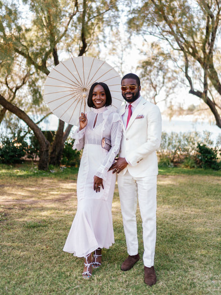Stylish wedding guests arriving at Ble Azure ceremony for luxury Nigerian destination wedding in Athens Greece.