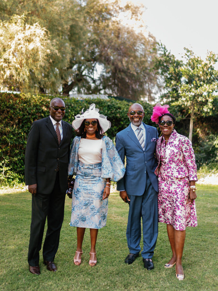 Wedding guests in formal and traditional Nigerian fashion at Ble Azure luxury destination wedding in Athens.