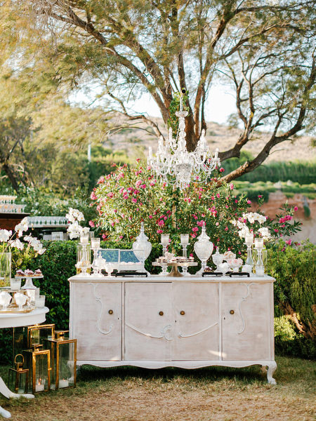 Woven hanging light installations above reception tables at Island Resort The Residence wedding in Athens Greece.