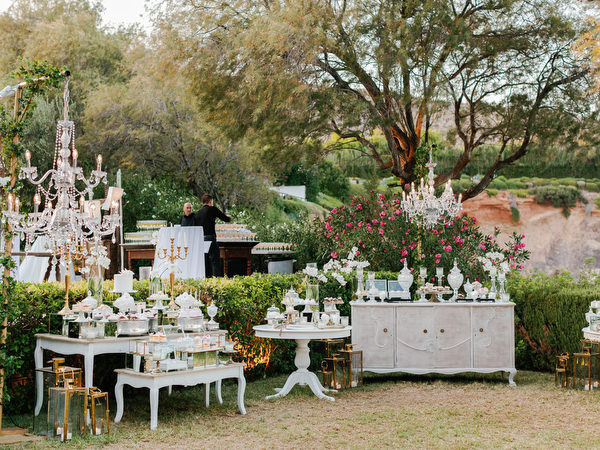Woven hanging décor and floral centerpieces at Island Resort The Residence luxury wedding reception Athens Riviera.