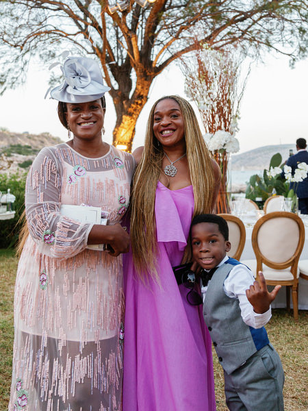 Family portrait during reception at Island Resort The Residence Nigerian destination wedding in Athens Greece.