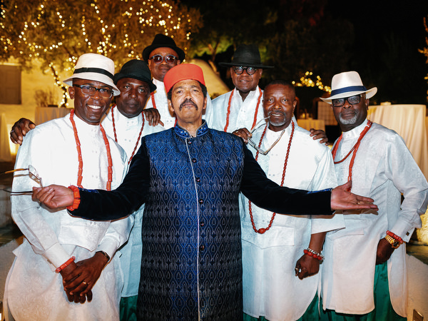 Men in traditional Nigerian attire celebrating at Island Resort The Residence luxury wedding reception in Athens Greece.