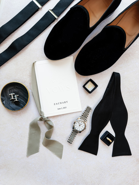 Black velvet loafers, bow tie, cufflinks, and wedding details styled for Jewish wedding in Athens at Margi luxury hotel