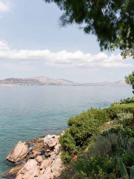 Mediterranean coastline and turquoise waters surrounding Island Resort Athens Riviera
