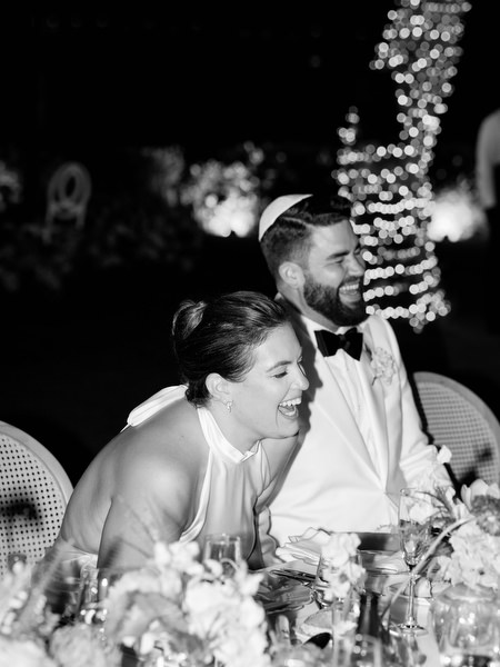 Joyful candid moment during speeches at Island Residence