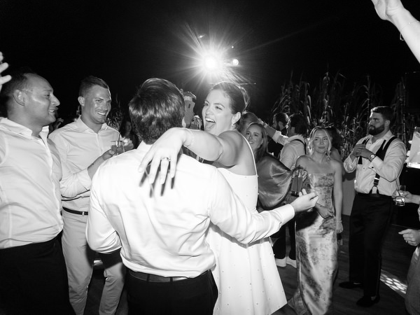 Emotional embrace in the middle of the dance floor at Island Residence