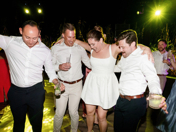 Guests shoulder-to-shoulder jumping and singing late into the night at Island Residence