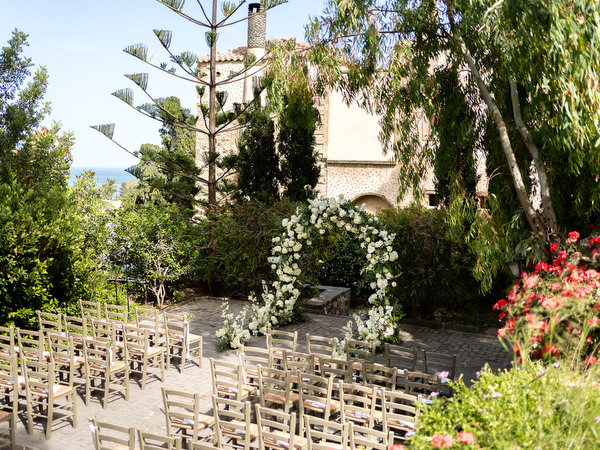 Outdoor ceremony setup at Kinsterna Hotel Monemvasia Greece.