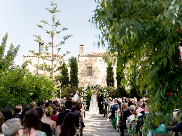 Outdoor wedding ceremony at Kinsterna Hotel Monemvasia Greece.