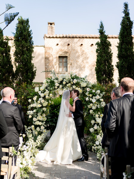 Bride and groom first kiss at Kinsterna Hotel Monemvasia wedding.