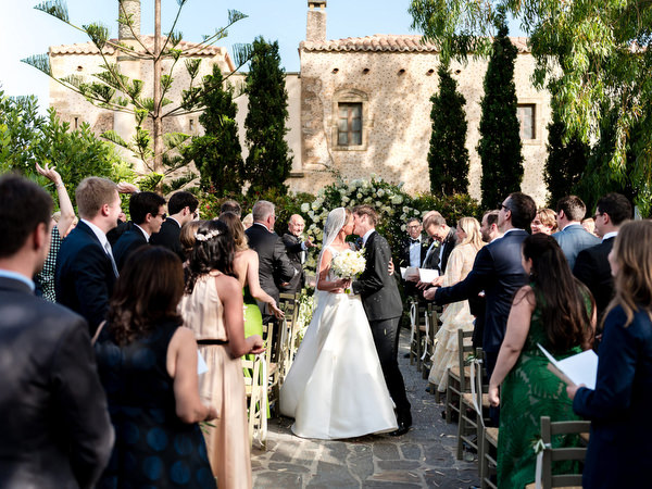 Bride and groom first kiss at Kinsterna Hotel Monemvasia wedding.