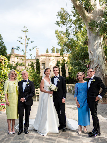 Family portrait at Kinsterna Hotel destination wedding in Greece.