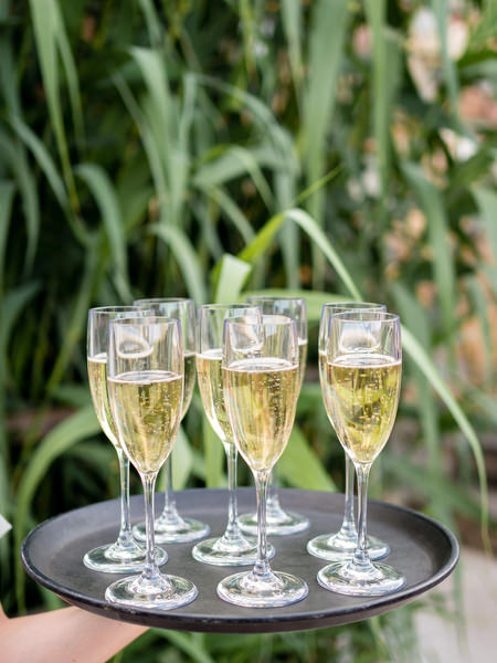 Champagne served at black-tie wedding Kinsterna Hotel Greece.