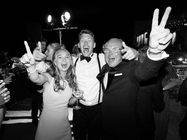 Guests celebrating on dance floor at Kinsterna Hotel wedding.