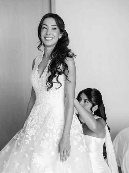 Bride in floral lace wedding gown during bridal preparations at Four Seasons Astir Palace