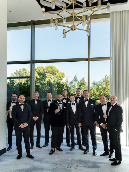 Groomsmen in black-tie attire at Four Seasons Astir Palace before the Athens Riviera wedding ceremony