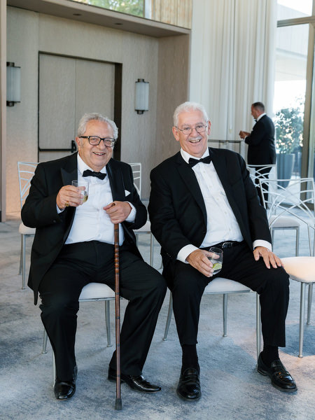 Family members enjoying pre-ceremony celebrations at a luxury Athens Riviera wedding