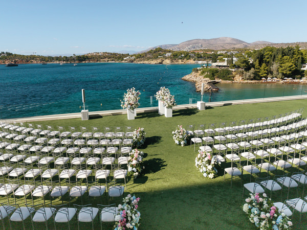 Luxury outdoor wedding ceremony overlooking the Aegean at Four Seasons Athens