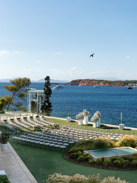Outdoor wedding ceremony with panoramic Athens Riviera views
